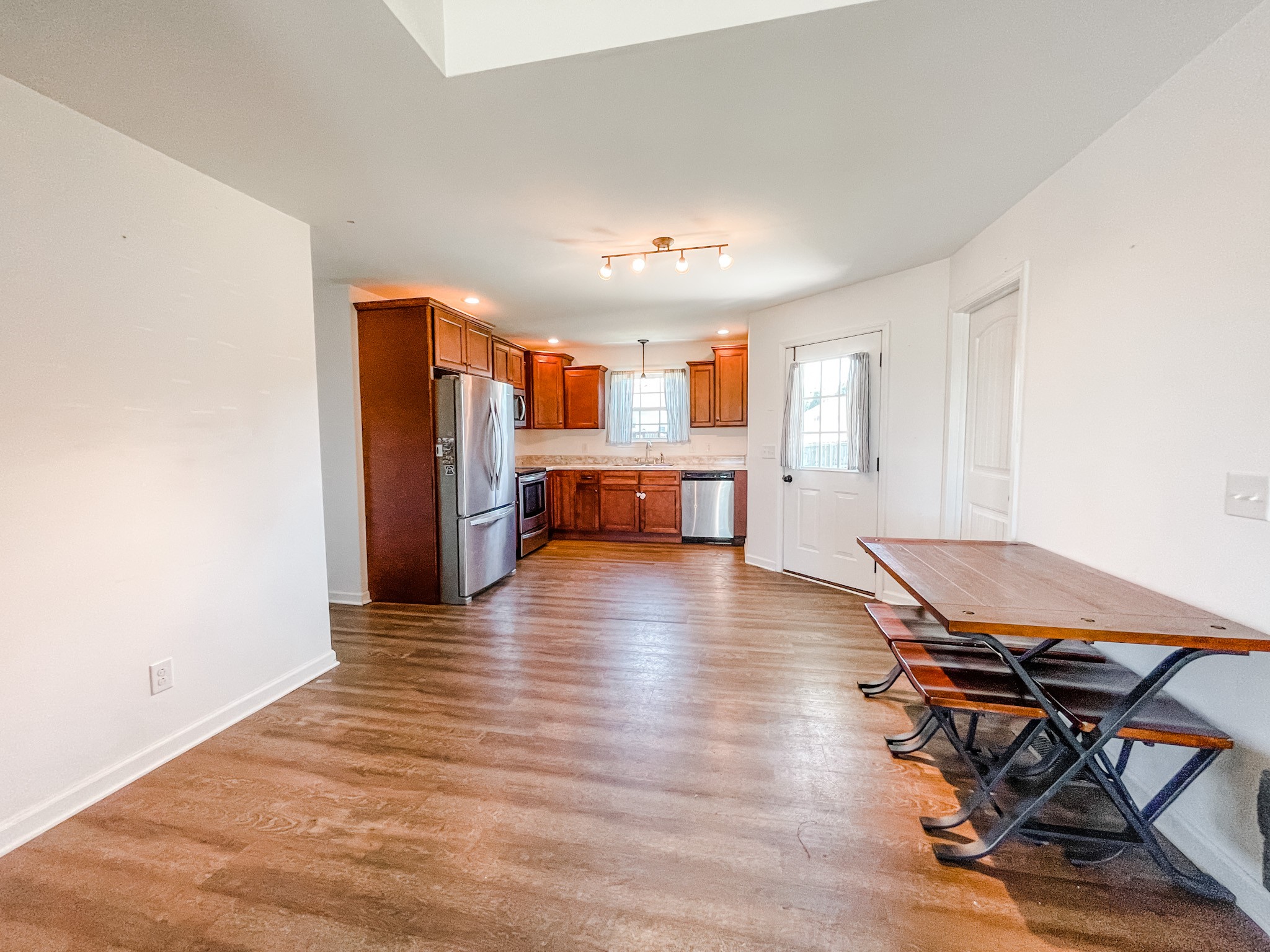 224 Shaub Road Portland, TN 37148 - Photo 5 of 23 a view of a room with furniture and wooden floor