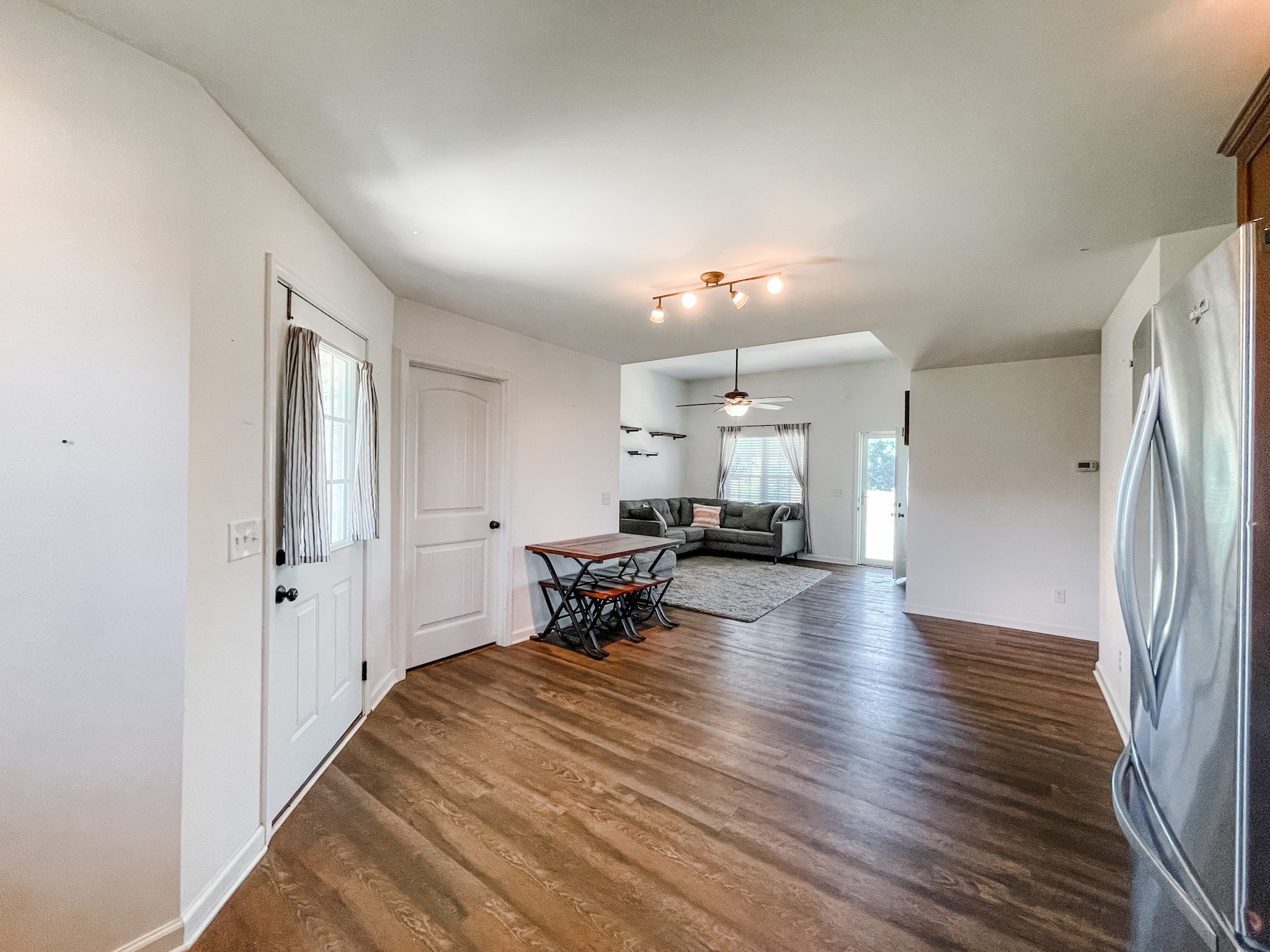 224 Shaub Road Portland, TN 37148 - Photo 10 of 23 a view of a living room and a livingroom with furniture wooden floor