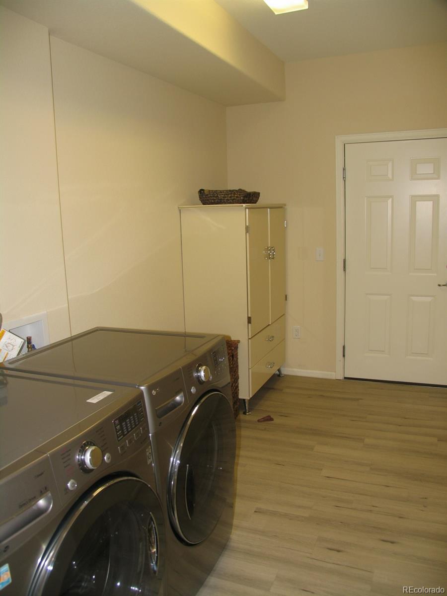 11331 Xavier Drive, Unit 103 Westminster, CO 80031 - Photo 13 of 30 a bathroom with a sink and a mirror