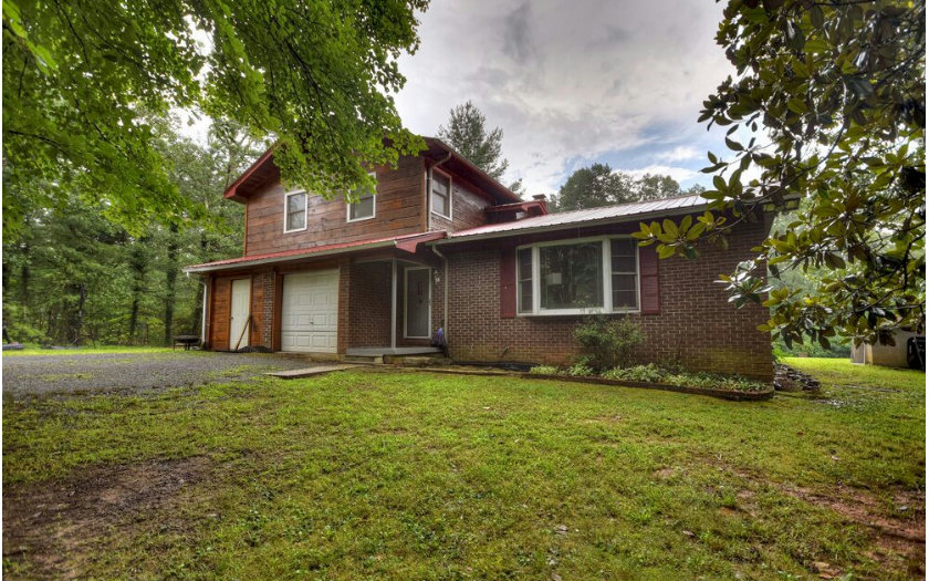 530 Stiles Road Epworth, GA 30541 - Photo 1 of 1 a front view of a house with a yard