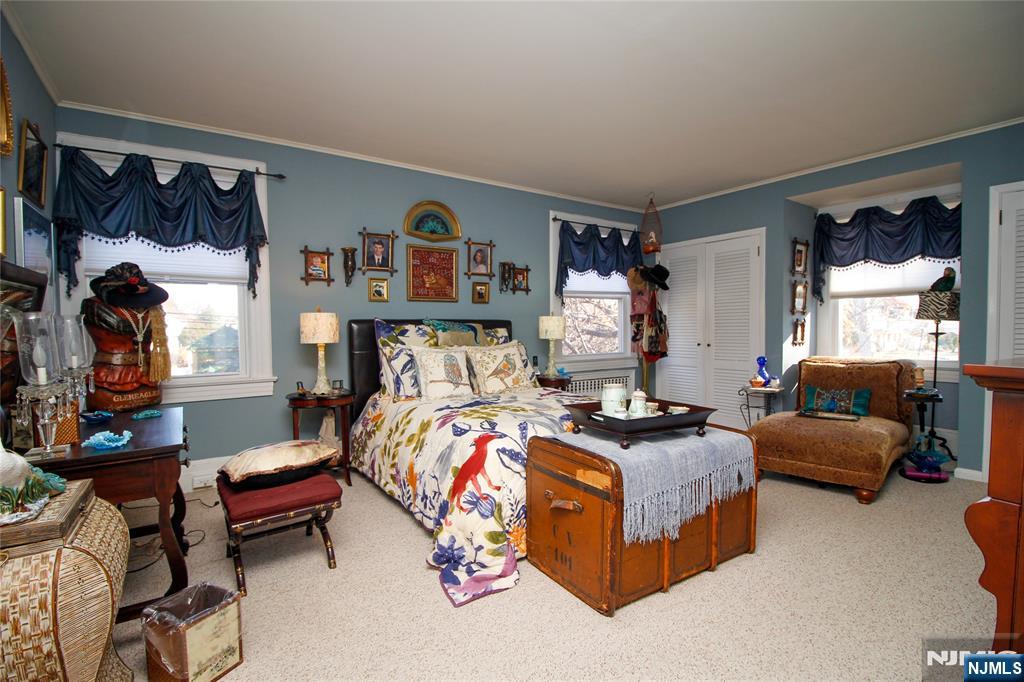 301 3rd Street Clifton, NJ 07011 - Photo 20 of 28 a bedroom with bed and a couch