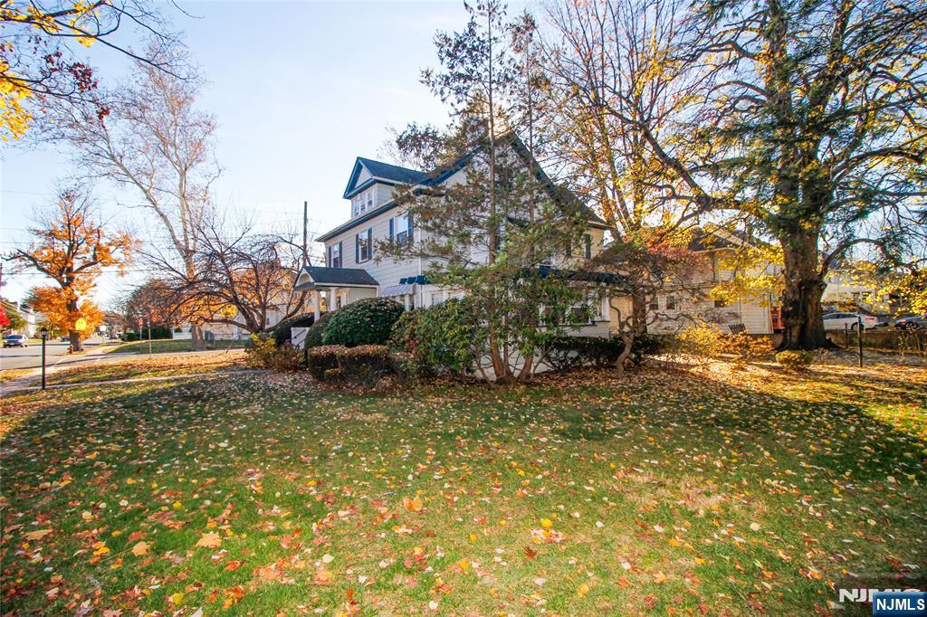 301 3rd Street Clifton, NJ 07011 - Photo 26 of 28 a backyard of a house with lots of green space