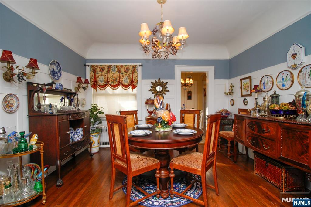 301 3rd Street Clifton, NJ 07011 - Photo 4 of 28 a view of a dining room with furniture and chandelier