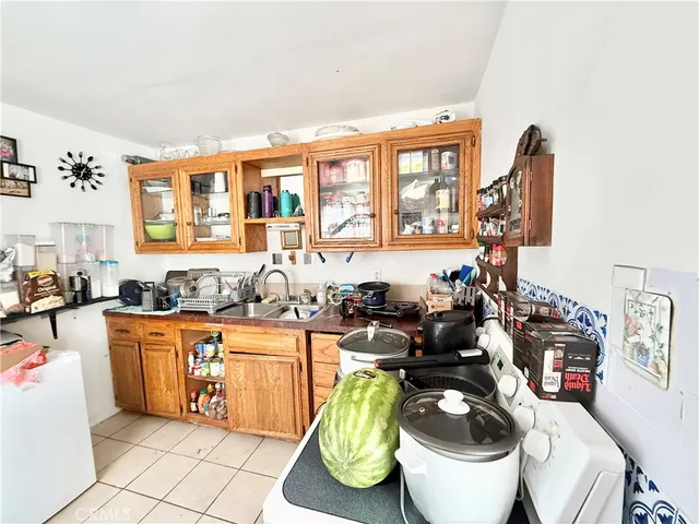 a view of a livingroom with furniture and a window