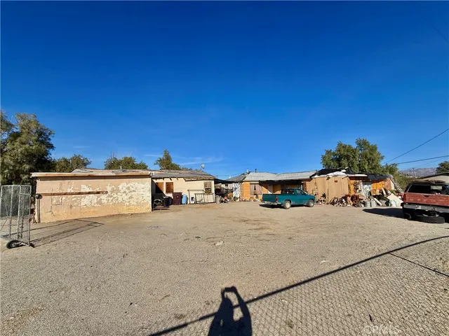 a view of a street with cars