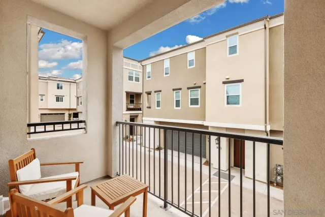 a view of a living room and entry way