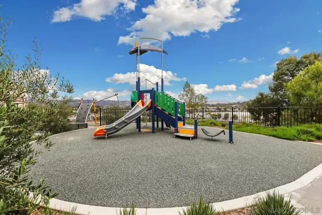 a view of a park with slide