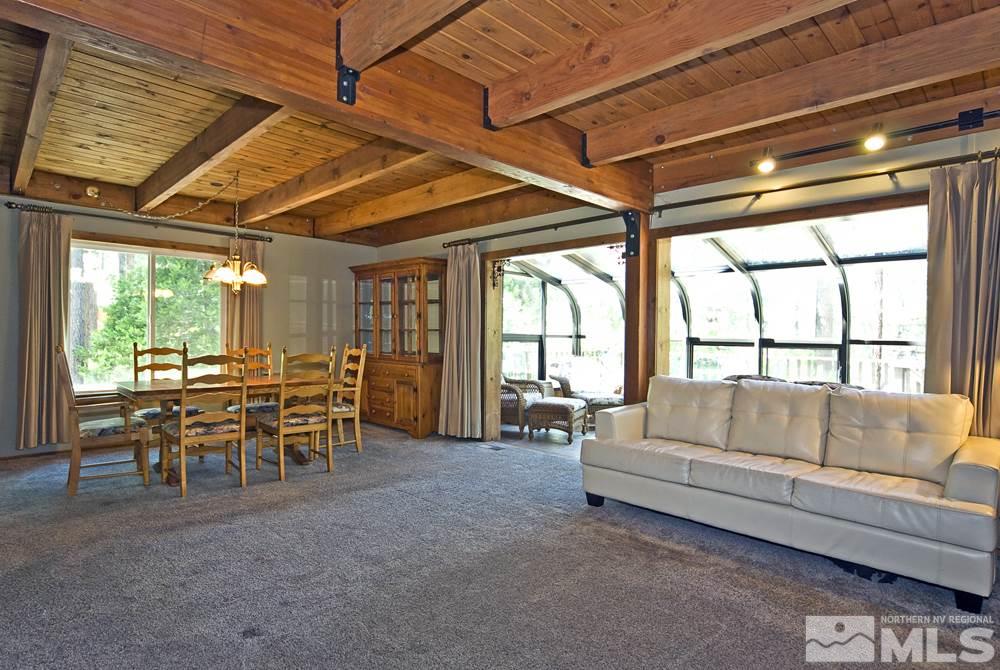 70 Pinon Road Markleeville, CA 96120 - Photo 11 of 25 a living room with furniture and a large window