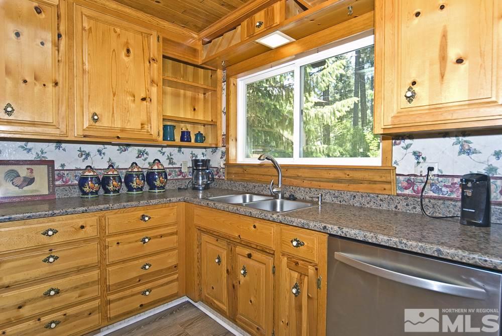 70 Pinon Road Markleeville, CA 96120 - Photo 14 of 25 a kitchen with granite countertop cabinets and window
