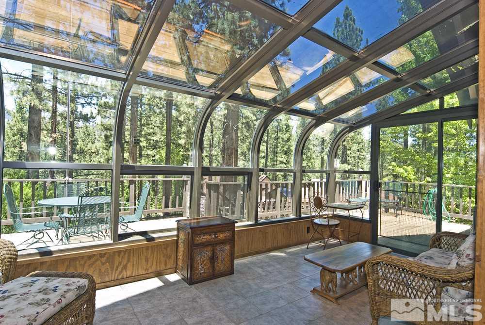 70 Pinon Road Markleeville, CA 96120 - Photo 16 of 25 a living room with furniture and a large window