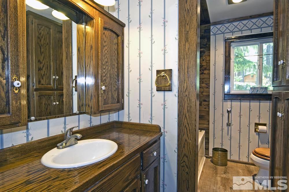 70 Pinon Road Markleeville, CA 96120 - Photo 18 of 25 a bathroom with a sink and a mirror
