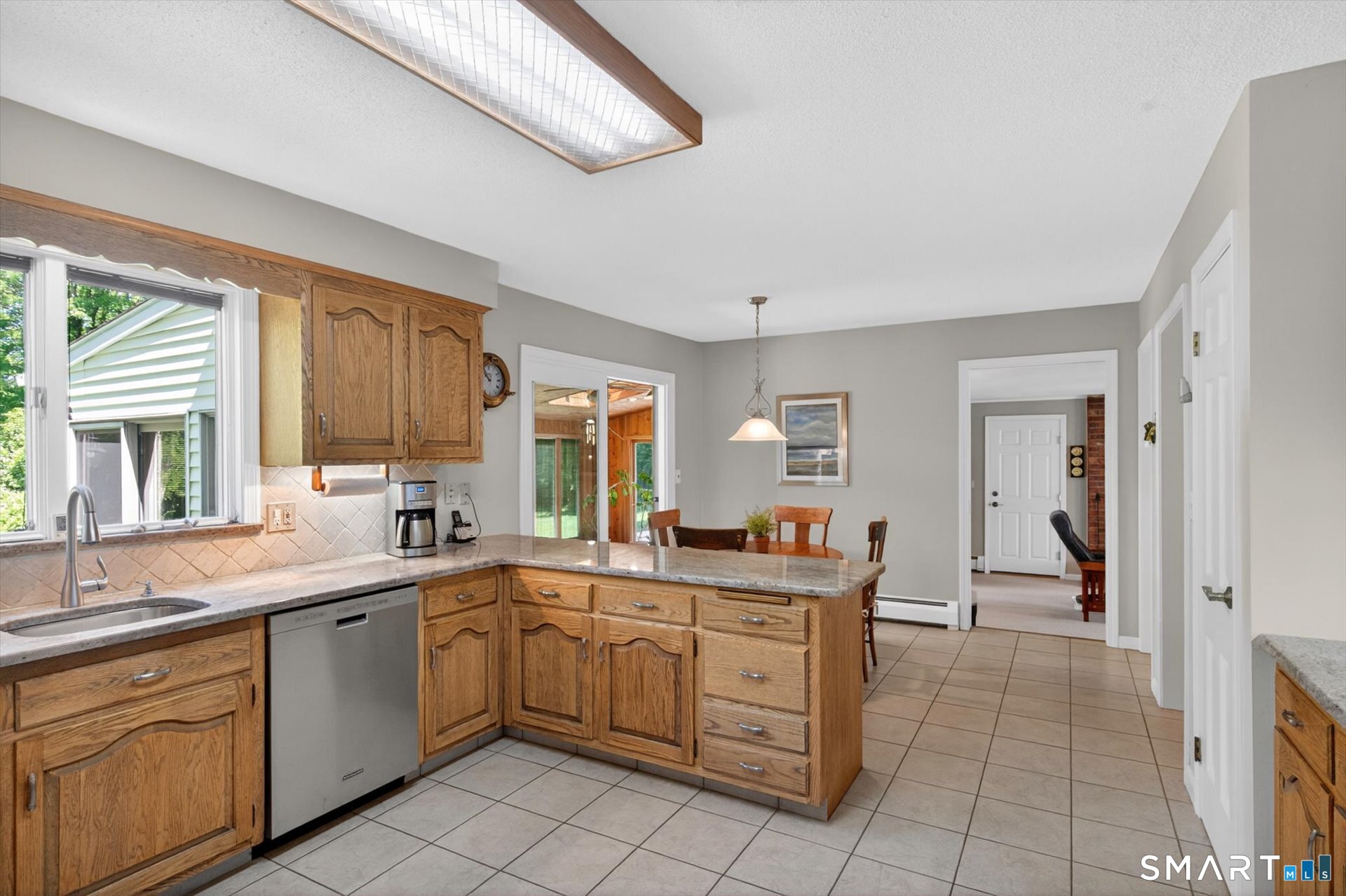 5 Shingle Mill Drive Canton, CT 06019 - Photo 13 of 38 a kitchen with a sink and cabinets