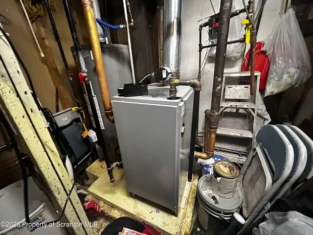 walk in closet with wooden floor