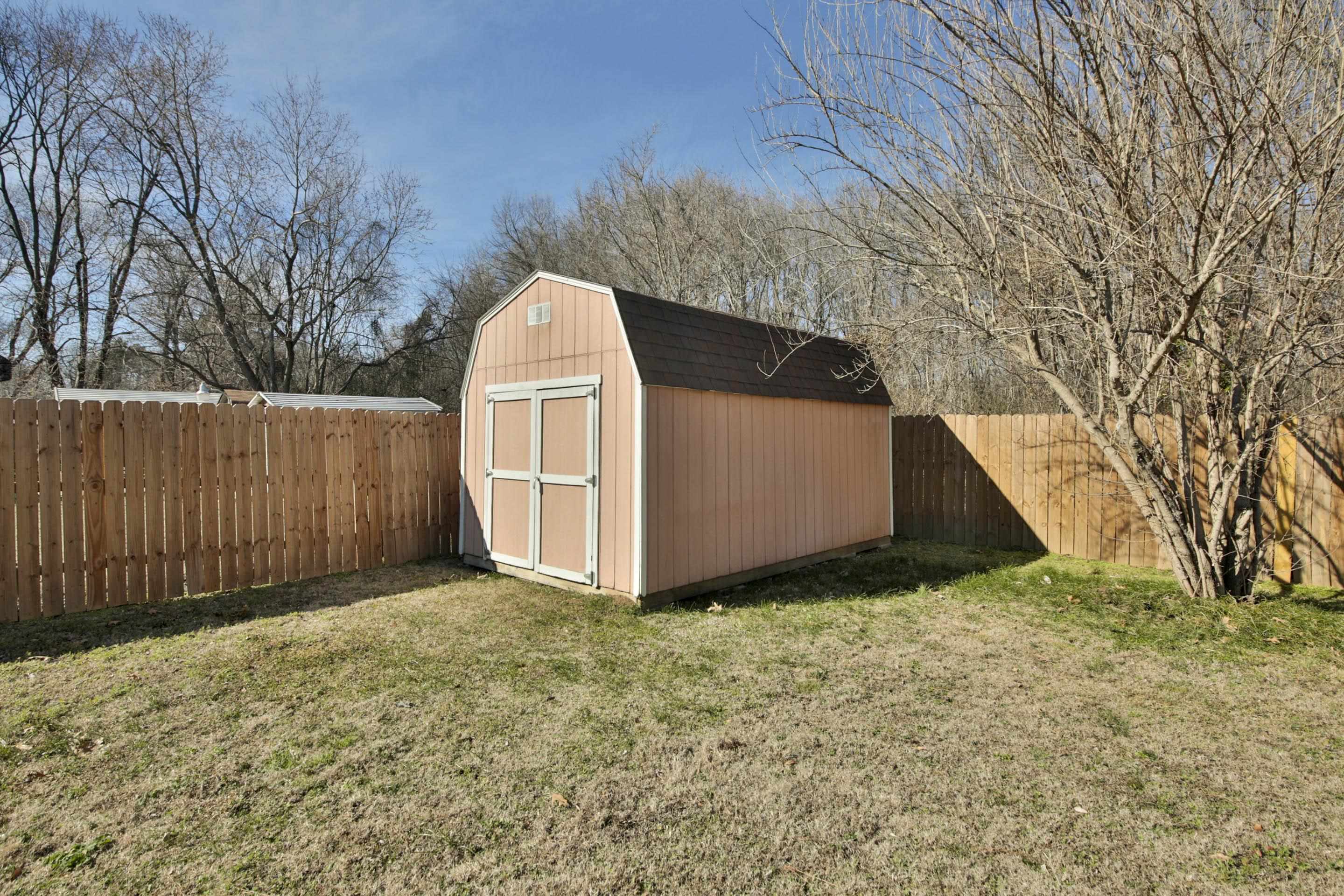 1820 West Holmes Road Memphis, TN 38109 - Photo 6 of 28 View of shed with a fenced backyard