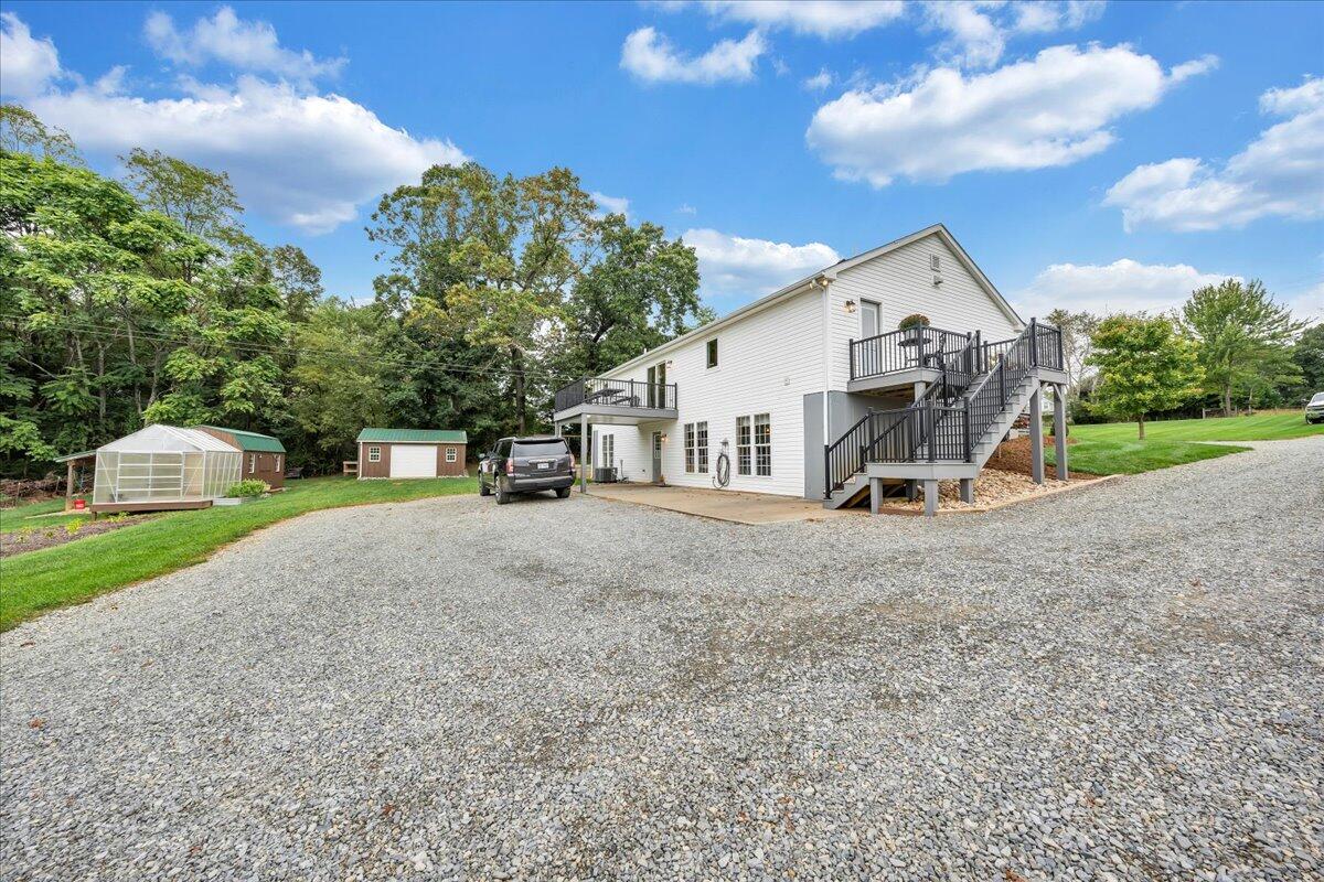 2405 Edwardsville Road Hardy, VA 24101 - Photo 7 of 68 a view of a house with a yard