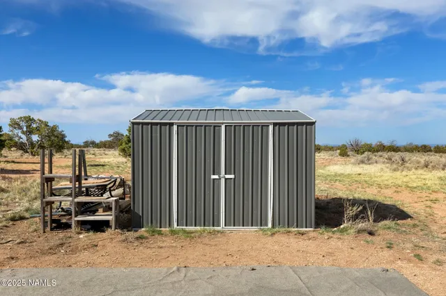 a view of a terrace with a yard