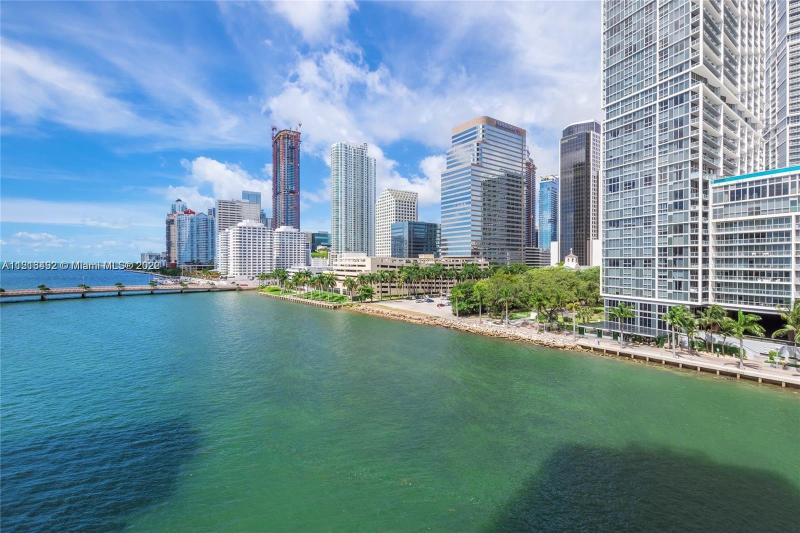 520 Brickell Key Drive, Unit A1102 Miami, FL 33131 - Photo 14 of 20 a view of a city with tall buildings and a big yard