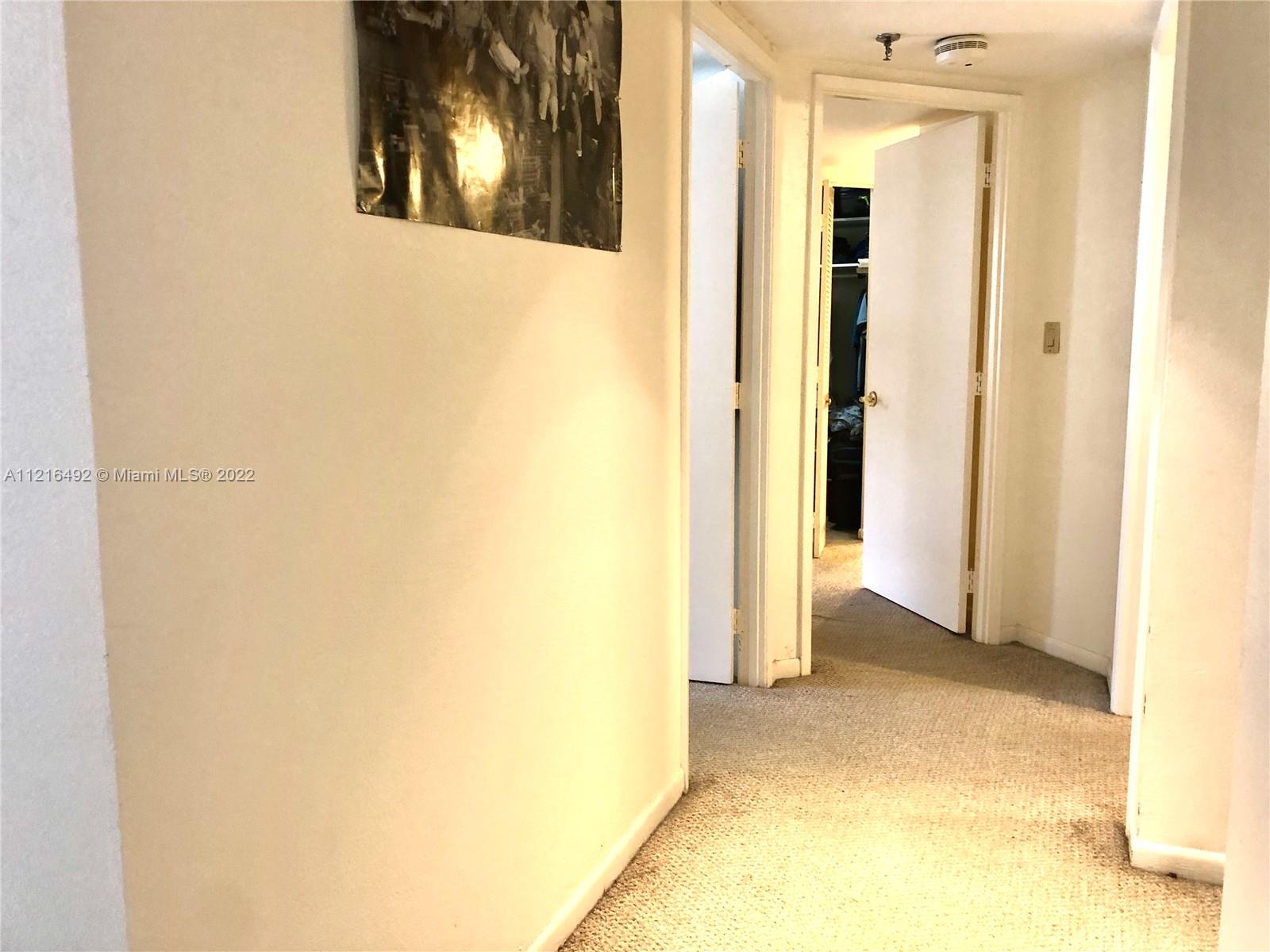 520 Brickell Key Drive, Unit A1102 Miami, FL 33131 - Photo 4 of 20 a view of a room with a hallway