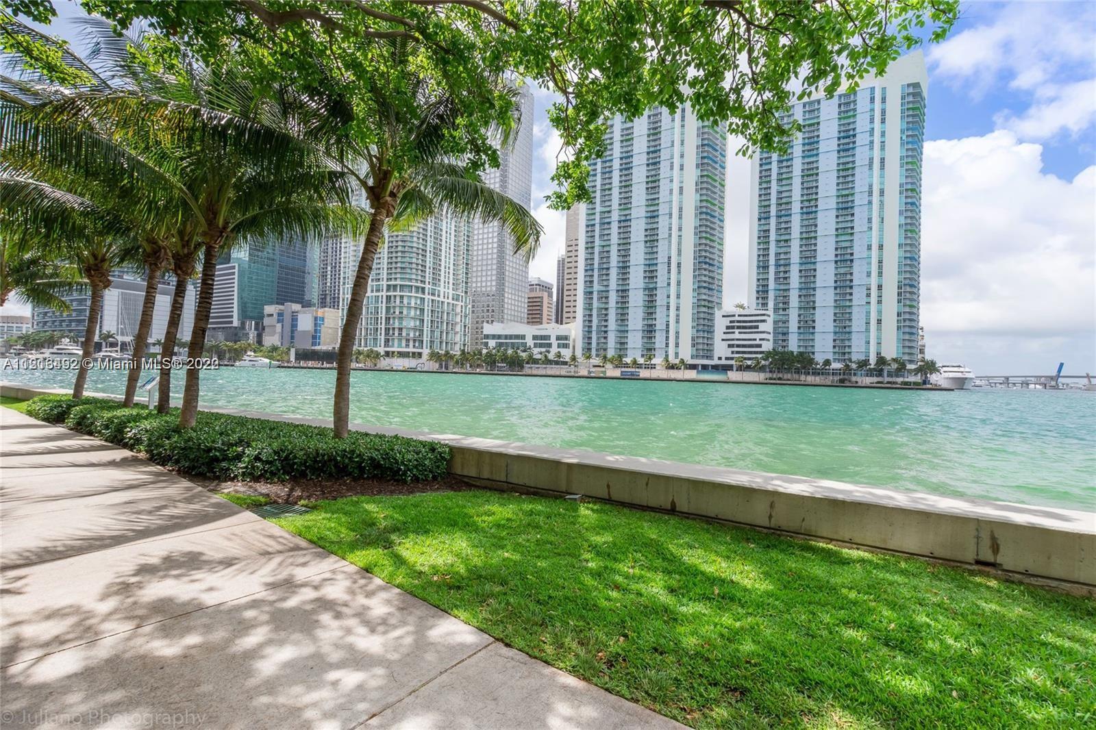 520 Brickell Key Drive, Unit A1102 Miami, FL 33131 - Photo 7 of 20 a view of a park with a big trees