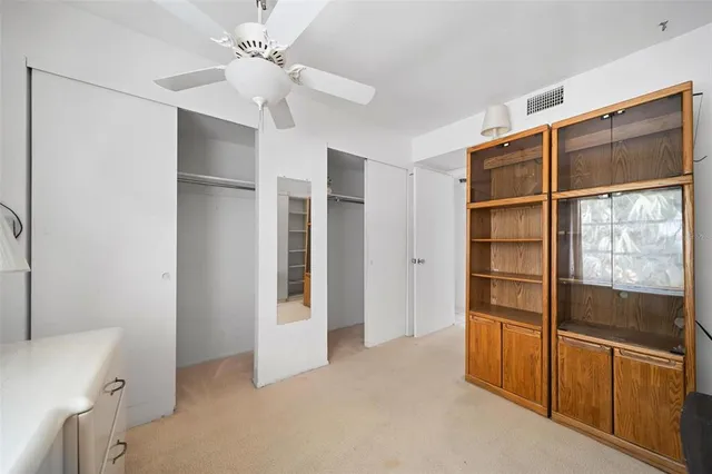 a view of a house with a yard and sitting space