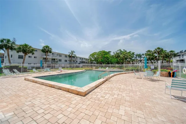 a view of a park with palm trees