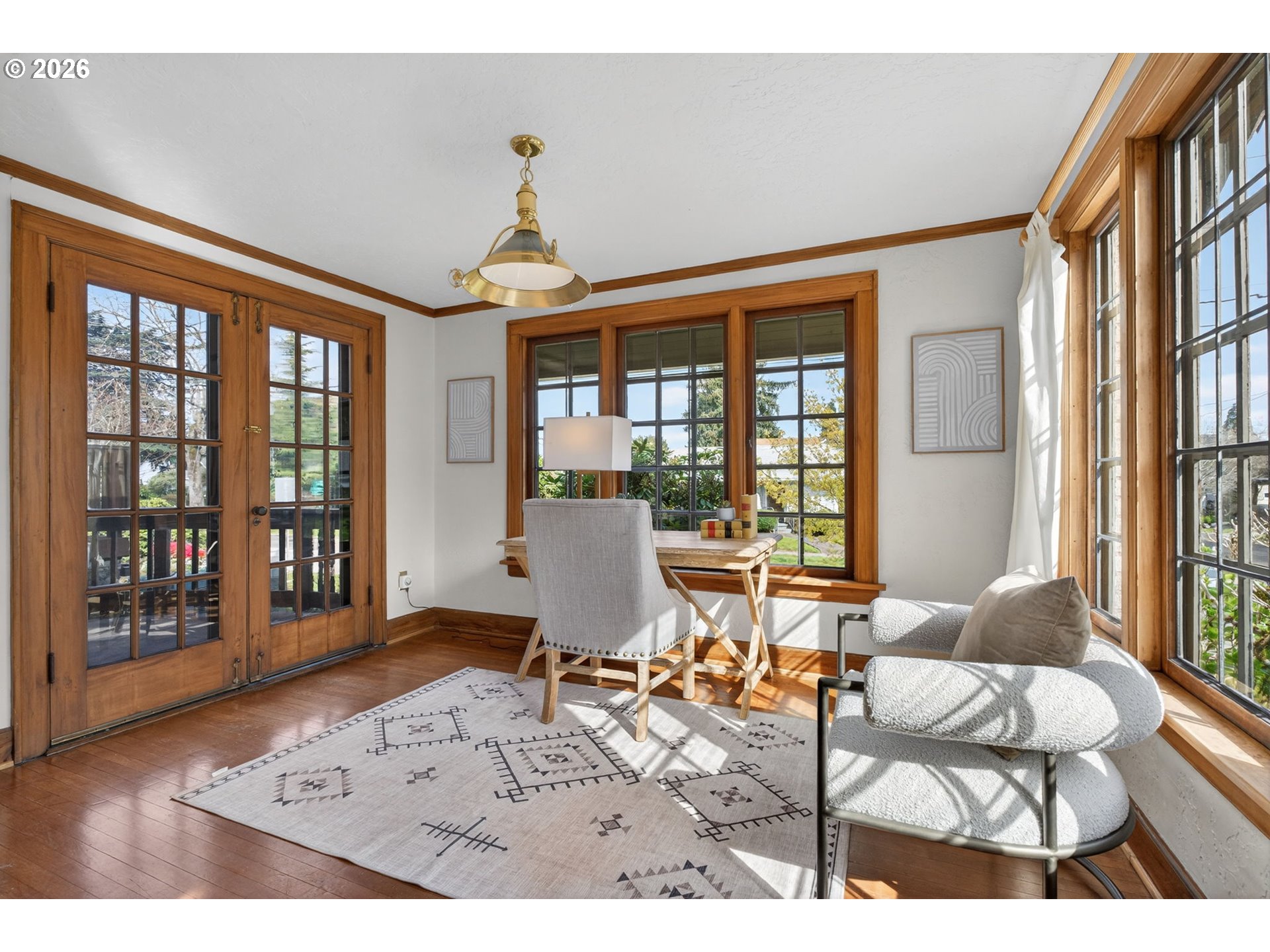 6971 North Vincent Avenue Portland, OR 97217 - Photo 12 of 48 a living room with furniture and large windows