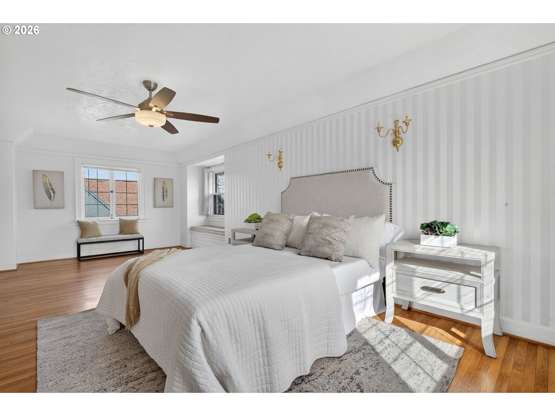 6971 North Vincent Avenue Portland, OR 97217 - Photo 26 of 48 a bedroom with a bed and a chandelier
