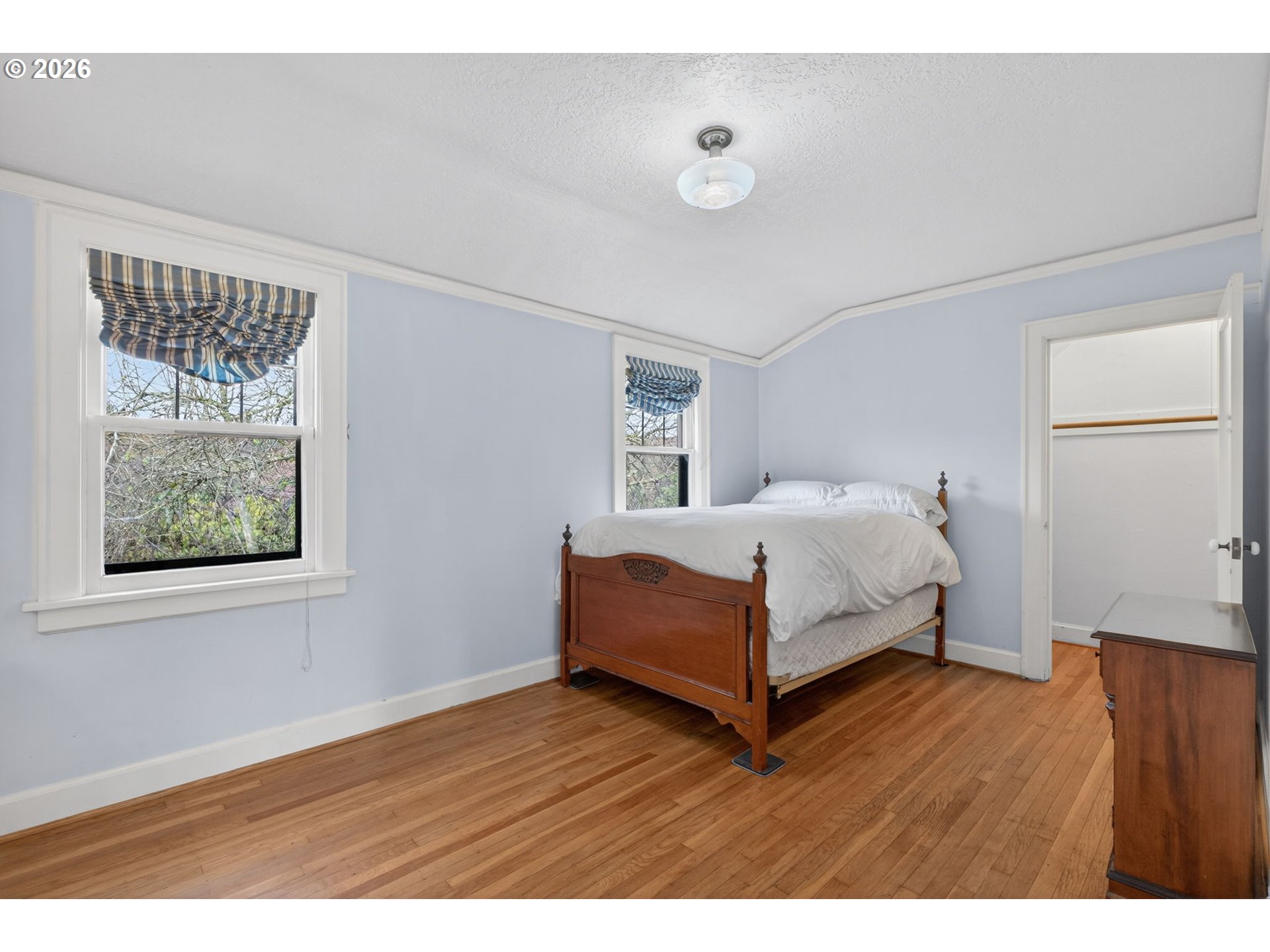 6971 North Vincent Avenue Portland, OR 97217 - Photo 27 of 48 a bedroom with a bed and a window