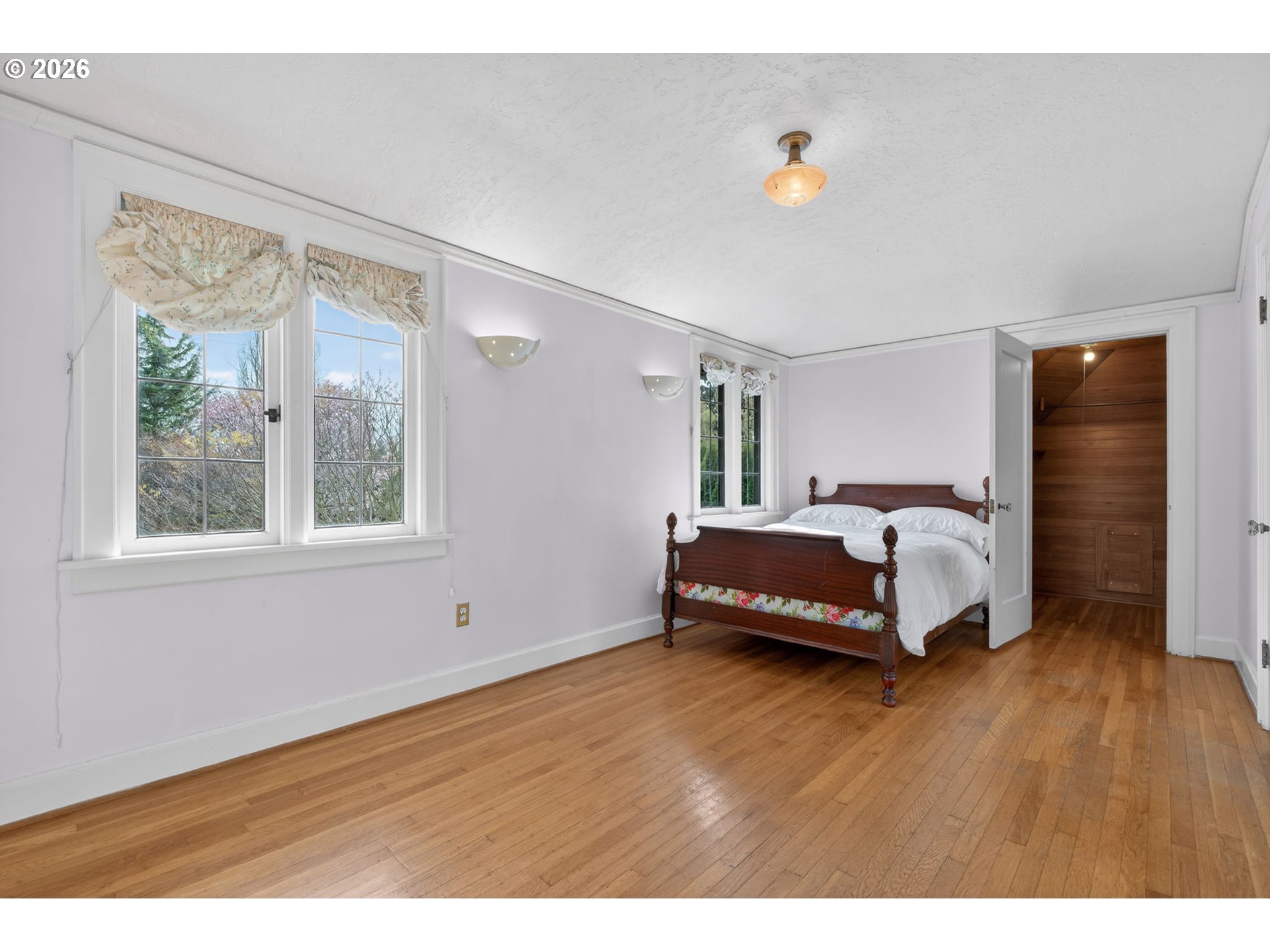 6971 North Vincent Avenue Portland, OR 97217 - Photo 30 of 48 a bedroom with a bed and window