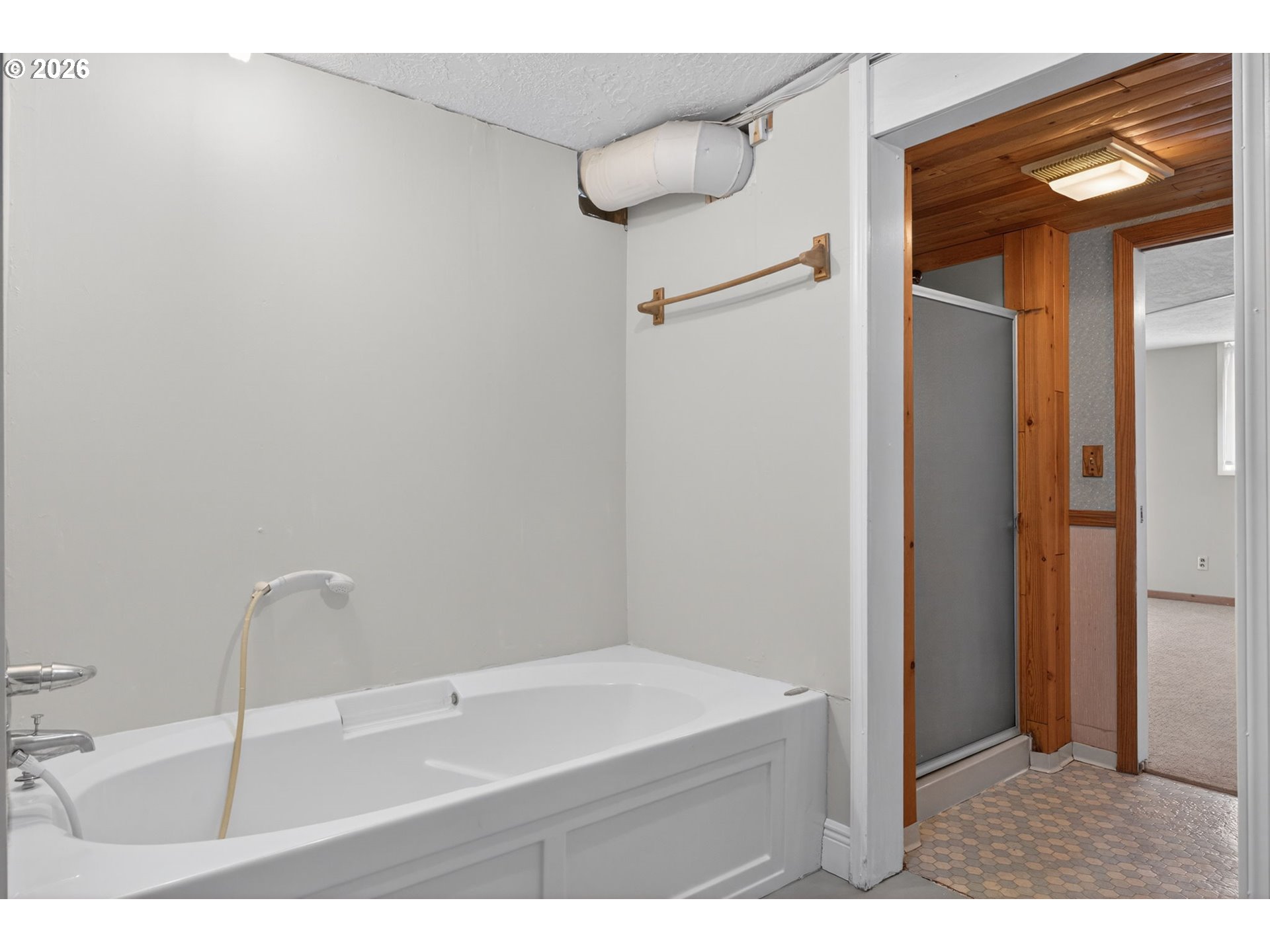6971 North Vincent Avenue Portland, OR 97217 - Photo 37 of 48 a bathroom with a sink and a mirror