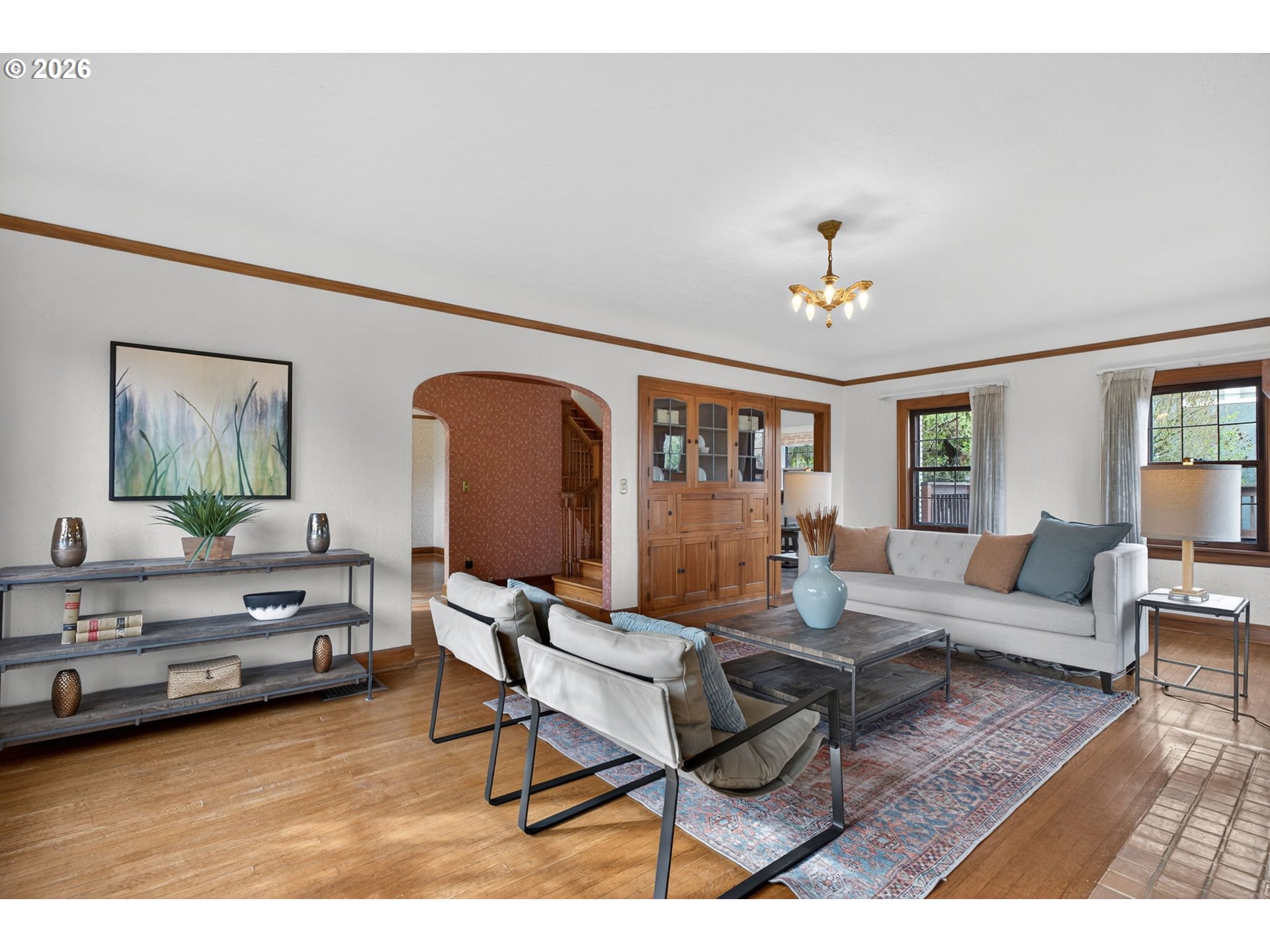 6971 North Vincent Avenue Portland, OR 97217 - Photo 6 of 48 a living room with furniture and wooden floor