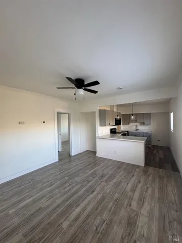 a view of kitchen with cabinets