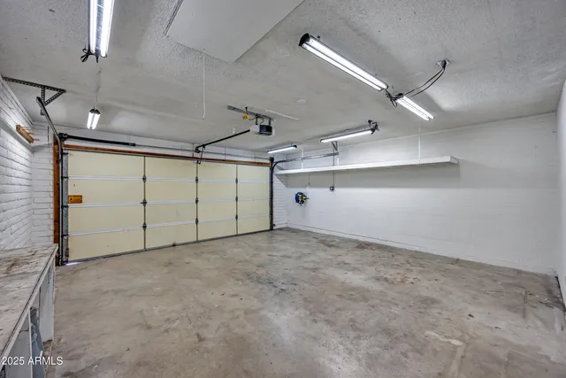 a front view of a house with garage