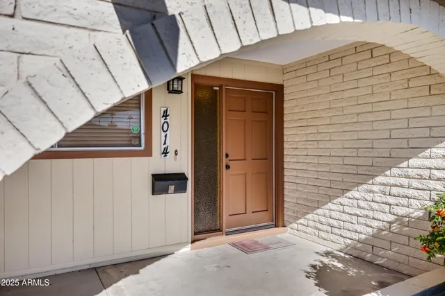 front view of a house with a street