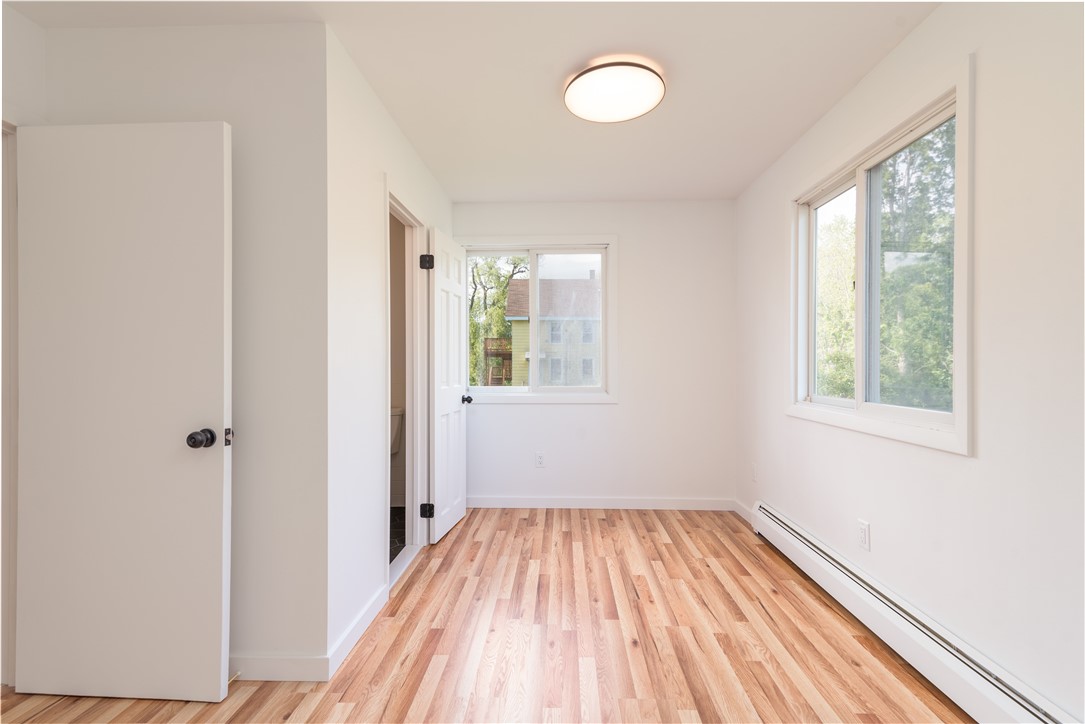 9 Christian Hill Road Westerly, RI 02891 - Photo 15 of 33 First floor bedroom with half bath.