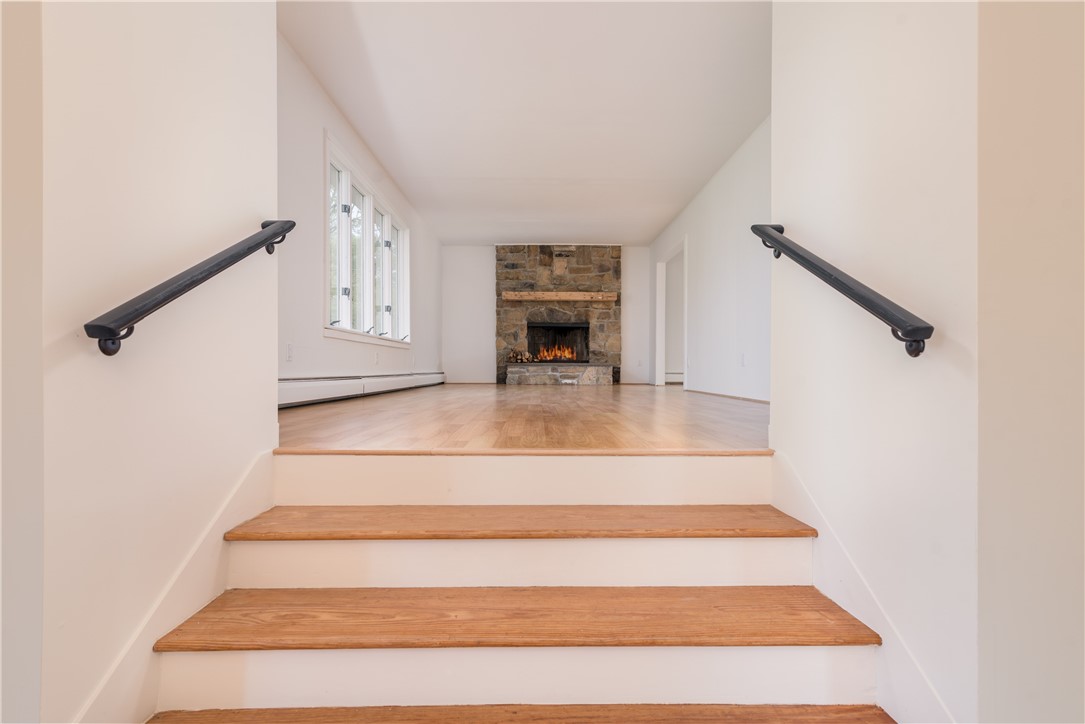 9 Christian Hill Road Westerly, RI 02891 - Photo 7 of 33 Living Room with stone fireplace