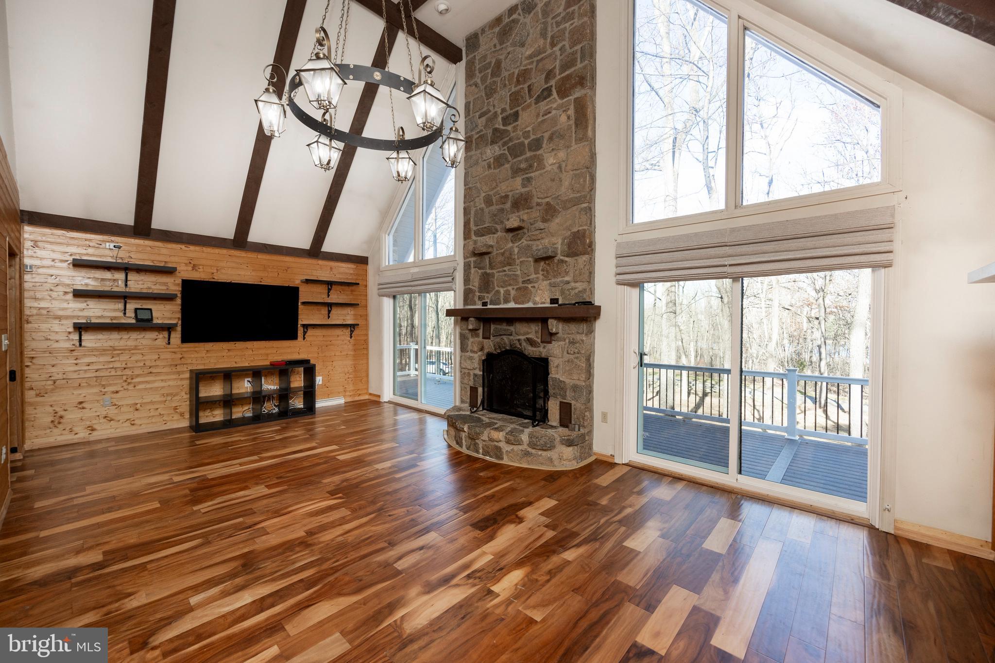 151 Bollinger Road Elverson, PA 19520 - Photo 5 of 37 Great Room with Floor-to-Ceiling Fireplace