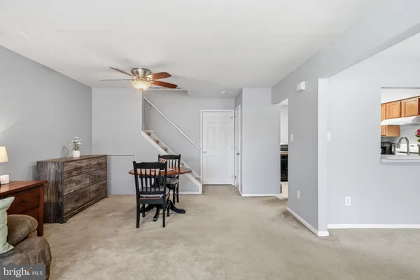 a living room with furniture with a window