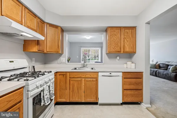 a view of workspace with cabinets