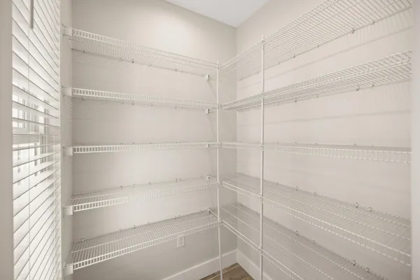 a view of a room with racks on the wall