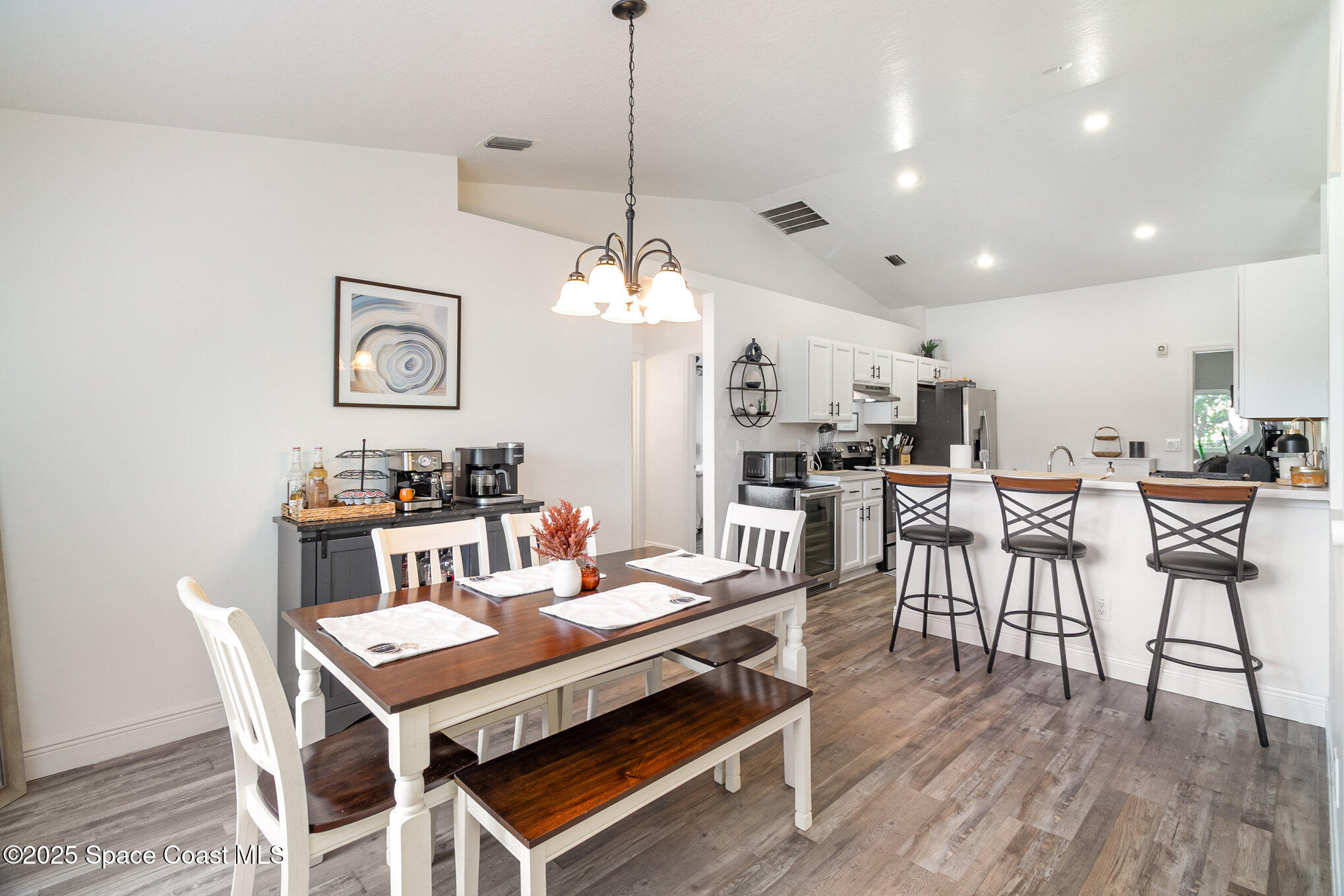 1170 Meadowbrook Road Northeast Palm Bay, FL 32905 - Photo 7 of 25 Dining View into Kitchen