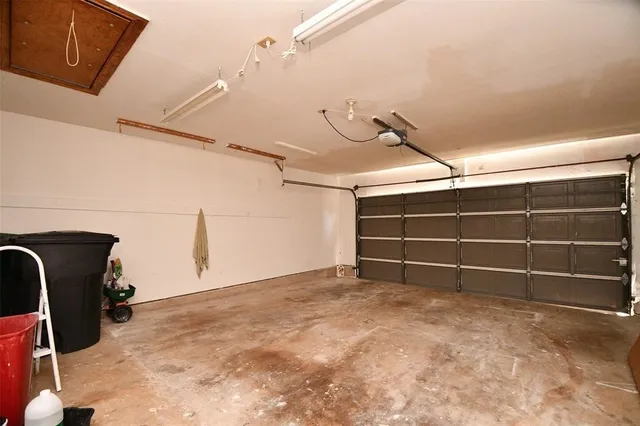 a view of an empty room with windows