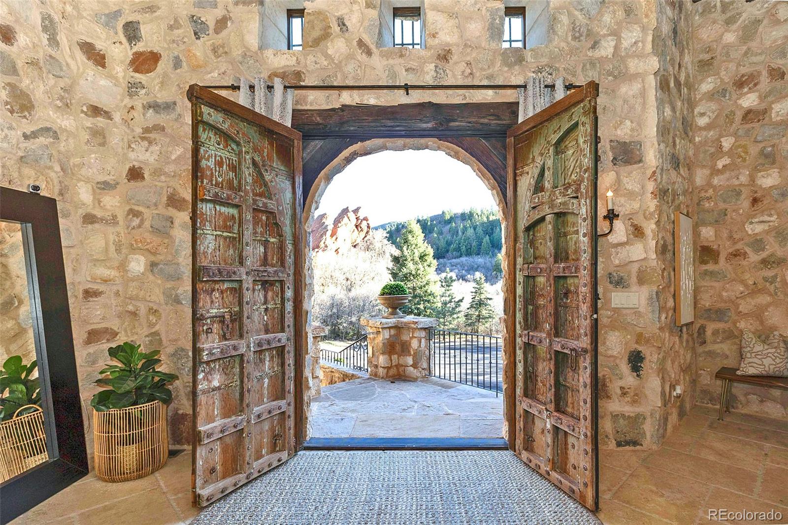 3755 North Rampart Range Road Littleton, CO 80125 - Photo 6 of 50 a view of a entryway door of the house
