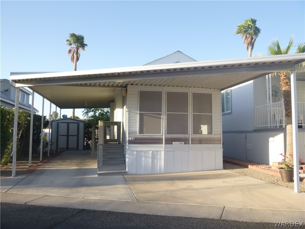 2000 South Ramar Road, Unit 688 Bullhead City, AZ 86442 - Photo 1 of 20 a view of a entryway door front of house