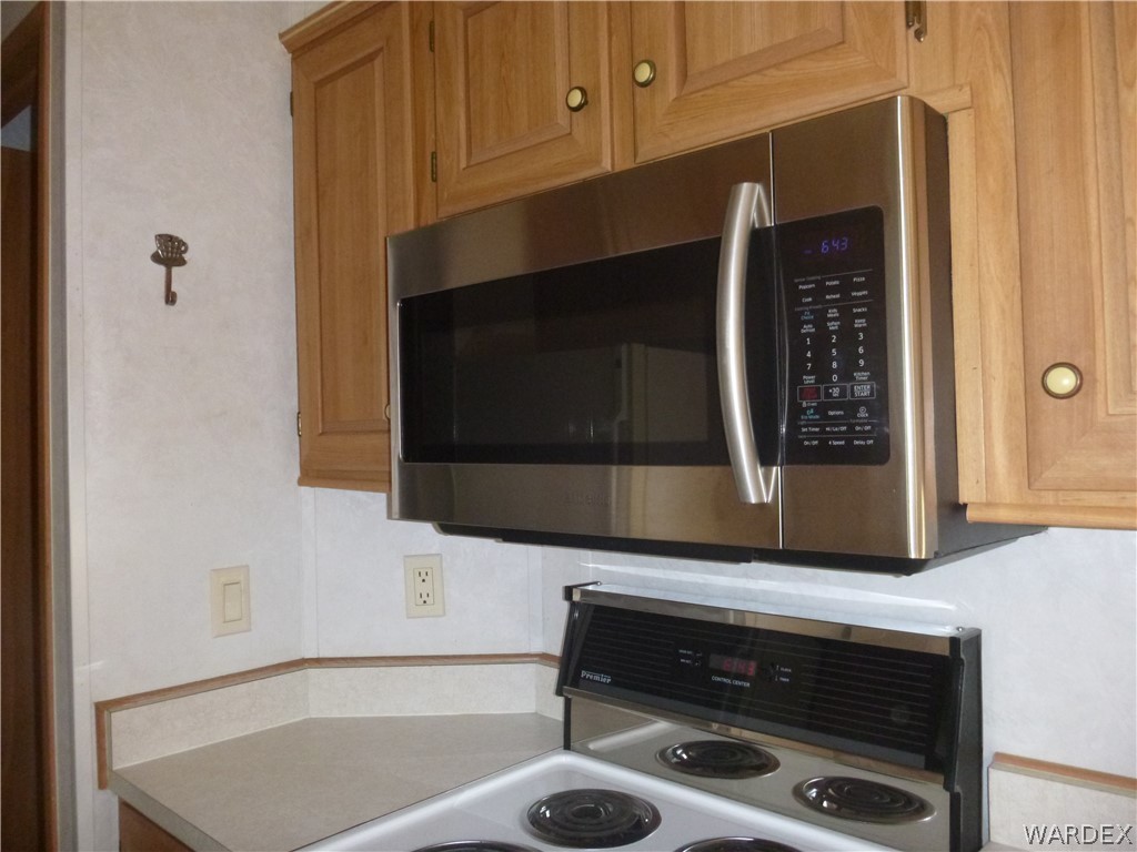2000 South Ramar Road, Unit 688 Bullhead City, AZ 86442 - Photo 18 of 20 a bathroom with a sink and a mirror