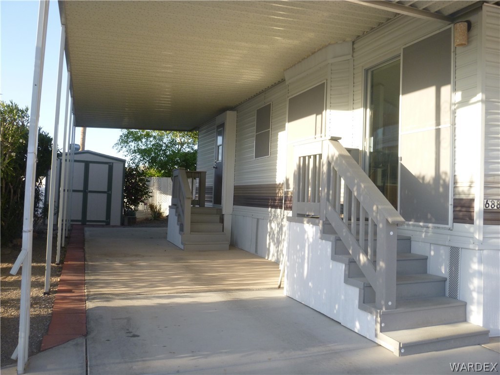 2000 South Ramar Road, Unit 688 Bullhead City, AZ 86442 - Photo 2 of 20 a view of a porch