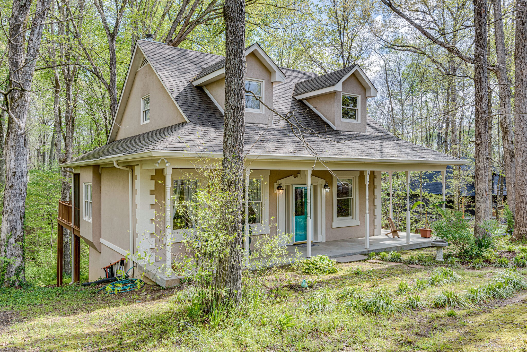 front view of a house with a yard