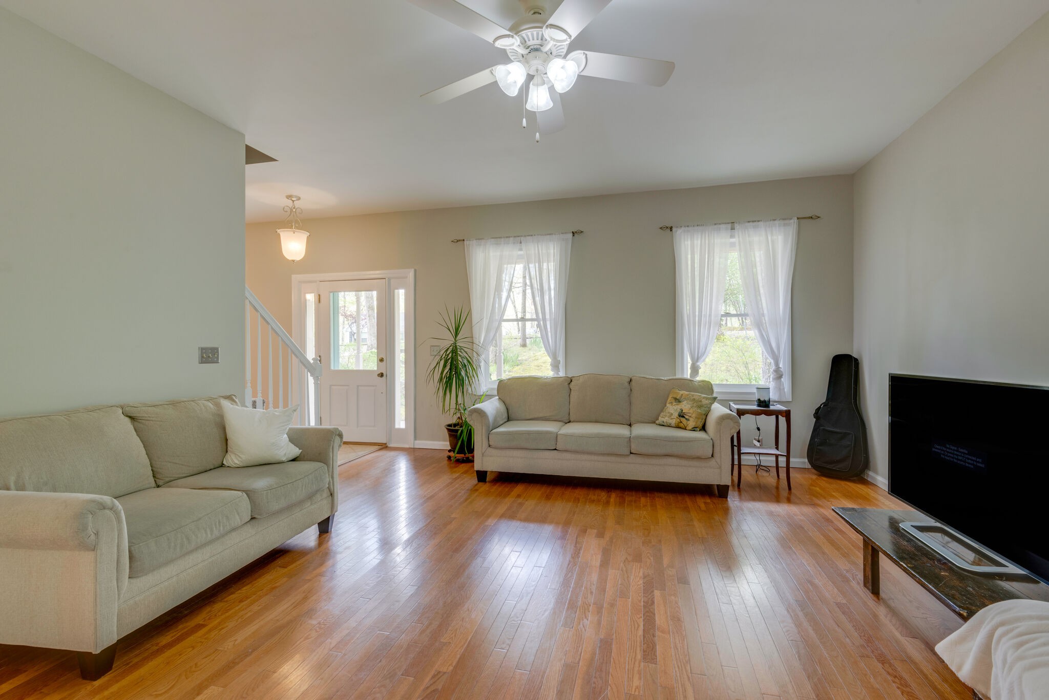215 Brown Owl Road Fairview, TN 37062 - Photo 4 of 25 a living room with furniture and a flat screen tv