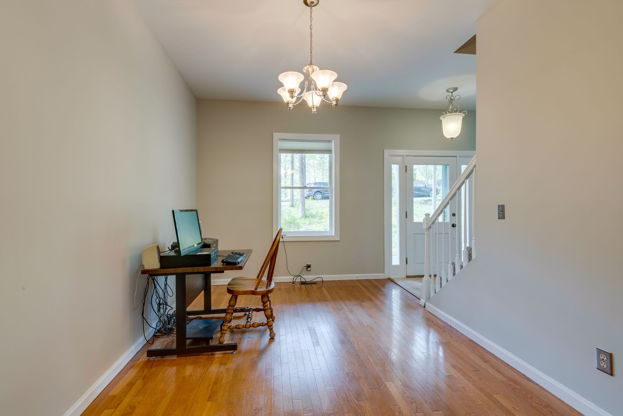 215 Brown Owl Road Fairview, TN 37062 - Photo 6 of 25 a workspace with wooden floor and a window