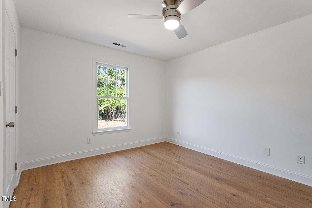 1402 Buckhorn Road Garner, NC 27529 - Photo 14 of 24 Primary Suite w/New Ceiling Fan